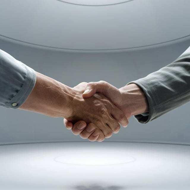 stretta di mano patto di collaborazione